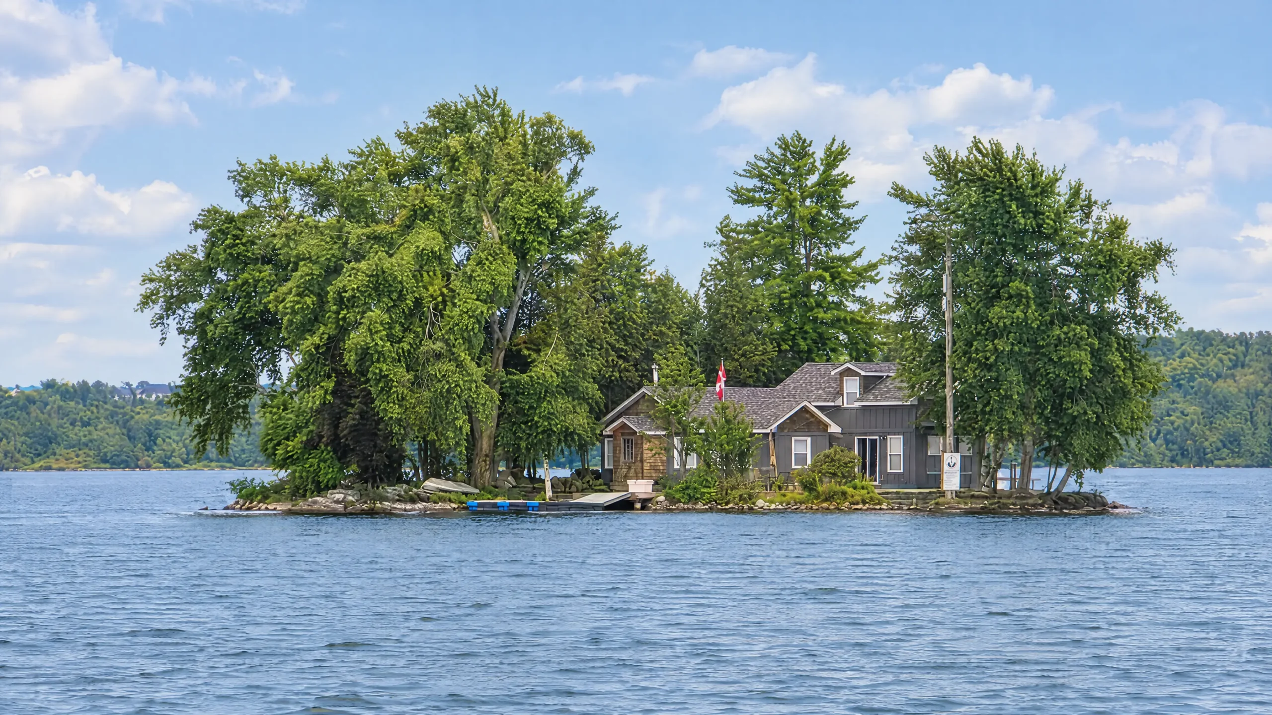 AI-enhanced island and water at Puslinch Lake, based on a 2014 photograph